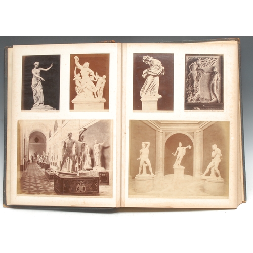 310 - A 19th century Grand Tour scrap album, enclosing photographic cuttings depicting sculpture, painting... 