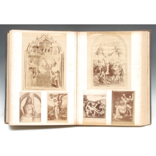 310 - A 19th century Grand Tour scrap album, enclosing photographic cuttings depicting sculpture, painting... 