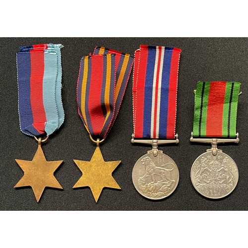 16 - WW2 British 1939-45 Star, Burma Star, War Medal and Defence Medal. All complete with ribbons.