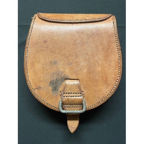 116 - WW2 British Army leather spare horse shoe pouch, complete with horse shoe, maker marked and dated 