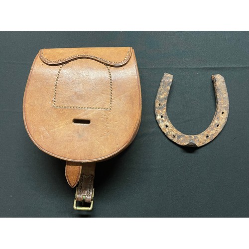 116 - WW2 British Army leather spare horse shoe pouch, complete with horse shoe, maker marked and dated 