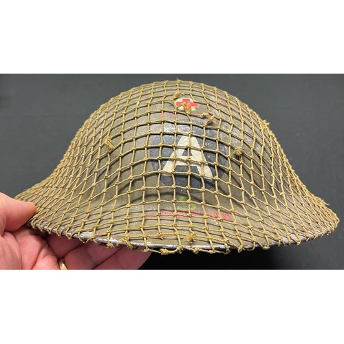 119 - WW2 Rare British Home Front Steel Helmet for the Peak District Ambulance Service. Insignia to the fr... 