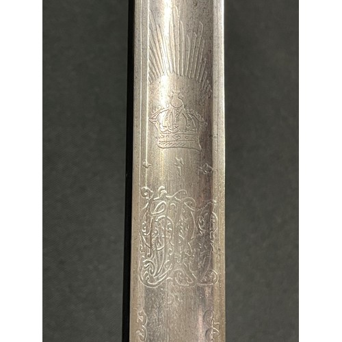 129 - WW2 British 1897 Pattern Officers Sword. 815mm long single edged fullered blade with etched decorati... 