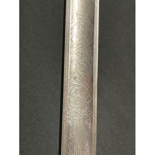 129 - WW2 British 1897 Pattern Officers Sword. 815mm long single edged fullered blade with etched decorati... 