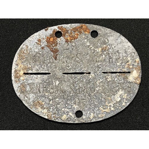 154 - WW2 Third Reich Freikorps Mohnke Identity Disc. Roll number 29. The tag appears to be ground dug. Th... 