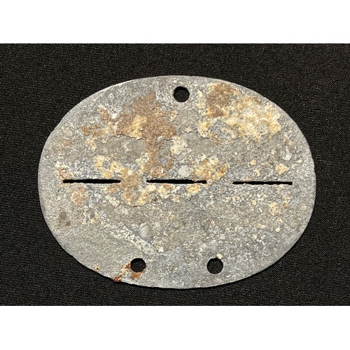 154 - WW2 Third Reich Freikorps Mohnke Identity Disc. Roll number 29. The tag appears to be ground dug. Th... 