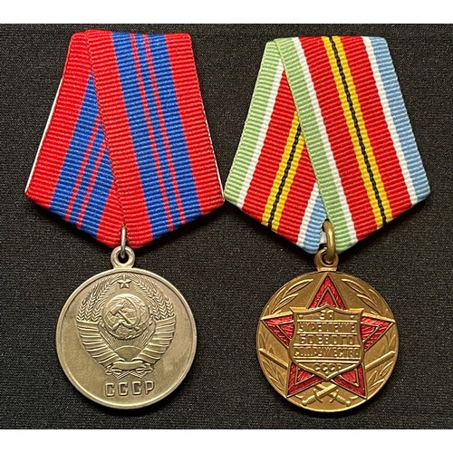 167 - Soviet medals: Medal for Strengthening of the Combat Commonwealth complete with suspension and ribbo... 