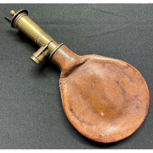 188 - A Sykes Patent Leather and Brass Shot Measure. Trademarked to neck. Removeable shot scoop which enab... 