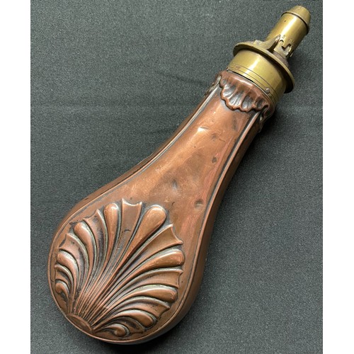 191 - A Brass and Copper Powder Flask embossed with a design of a Clam Shell. Four adjustable measures of ... 