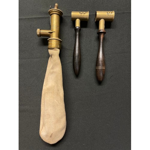 194 - A collection of three Black Powder Measures. One brass measure with adjustable settings from 5 3/4 d... 