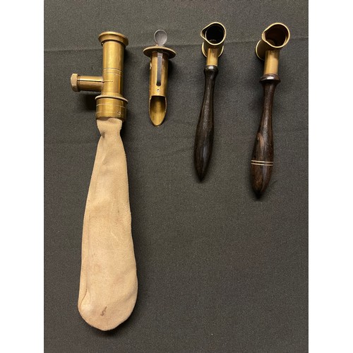 194 - A collection of three Black Powder Measures. One brass measure with adjustable settings from 5 3/4 d... 