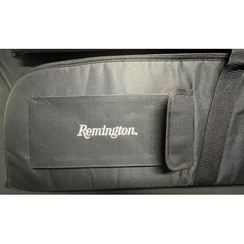 195 - Pair of Remington Padded Gun Slips in black. With carrying handle and shoulder sling. Has extra pouc... 