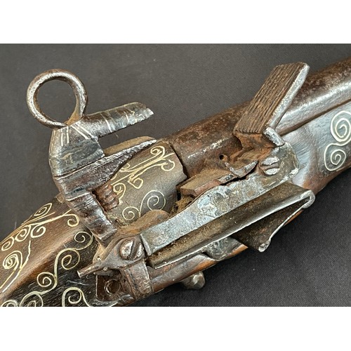 202 - Balkan style Flintlock Pistol with 270mm long barrel. Approx. 13mm Bore. Working action. Decorated s... 