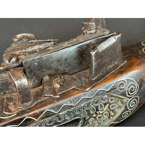 202 - Balkan style Flintlock Pistol with 270mm long barrel. Approx. 13mm Bore. Working action. Decorated s... 