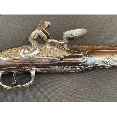 203 - Flintlock Pistol with 360mm long barrel. Bore approx. 15mm. Overall length 548mm. Action will only h... 