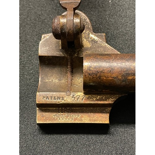 207 - A 19th century patent James Dixon & Son #1182 ball cartridge creaser, Cal. 577. Brass body, colour h... 