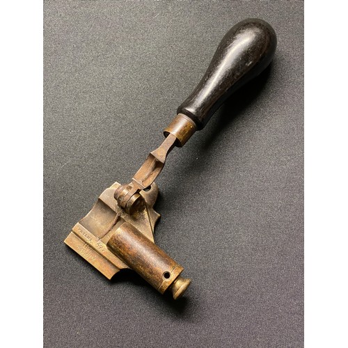 207 - A 19th century patent James Dixon & Son #1182 ball cartridge creaser, Cal. 577. Brass body, colour h... 