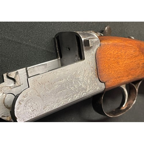 281 - Mistral Over and Under 20 Bore Shotgun with 695mm long barrels. Serial number 87469. Overall length ... 