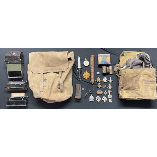 131 - WW2 and post war British Militaria collection comprising of : Army Respirator complete in gas mask b... 