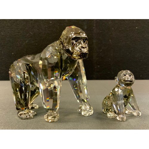 77 - A Swarovski Crystal Endangered Wildlife model, Gorilla Standing;  conforming baby gorilla (2)