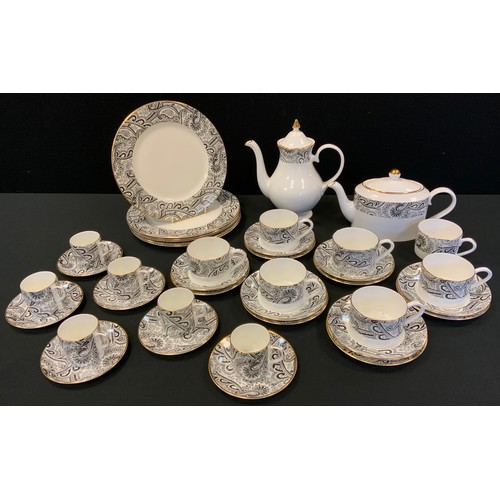 185 - A Royal Duchy tea and coffee service, for six, comprising teapot, coffee pot, large cups, smaller cu... 