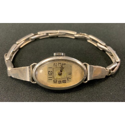 343 - A Rolex Art Deco ladies 935 silver cased bracelet wristwatch, oval silvered dial, Arabic Numerals, m... 