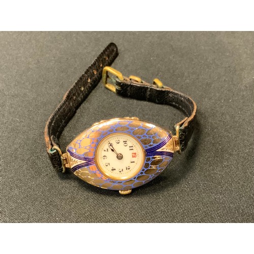 344 - A 9ct gold lady's wristwatch, enamelled, leather strap