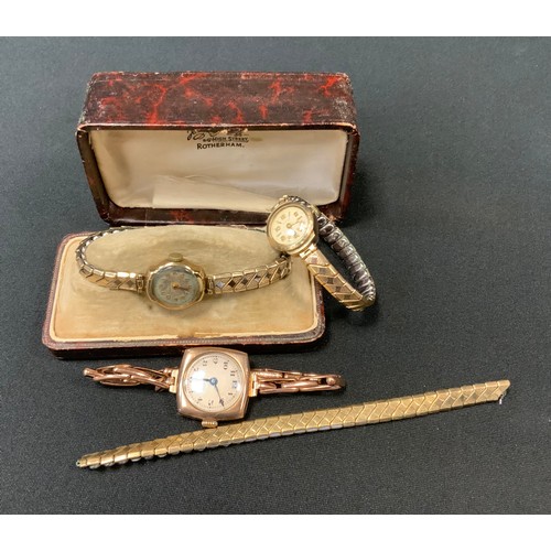 346 - A 9ct gold lady's wristwatch;  a 9ct gold Avia wristwatch;  a 9ct gold Record wristwatch (3)