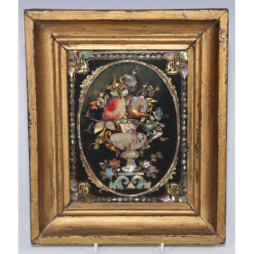 5216 - A Victorian mother-of-pearl marquetry and black papier-mâché rectangular panel, decorated with a sti... 