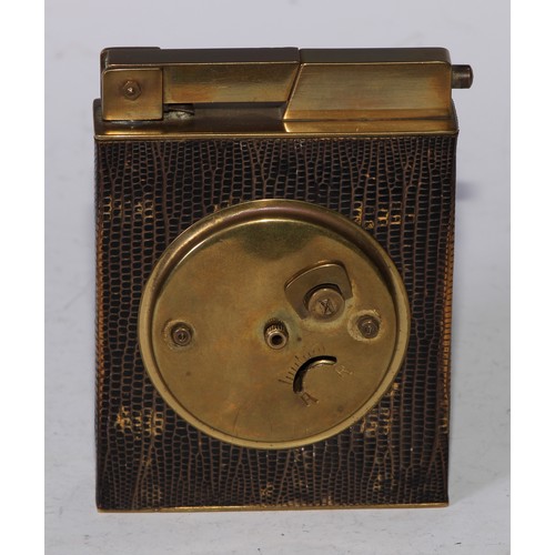 5099 - A French Art Deco combination table cigarette lighter and travelling timepiece, the 5cm rounded rect... 