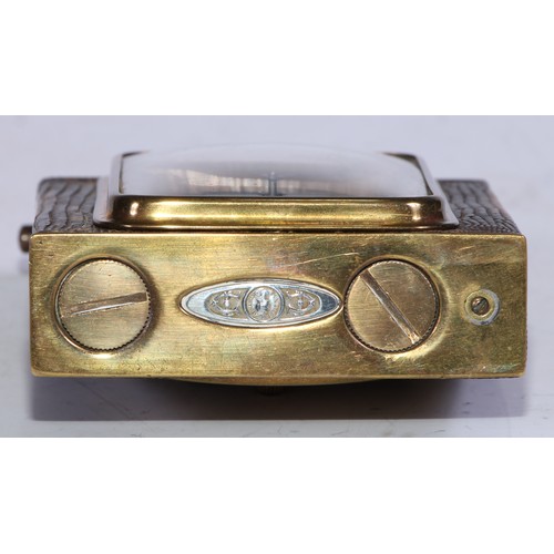 5099 - A French Art Deco combination table cigarette lighter and travelling timepiece, the 5cm rounded rect... 