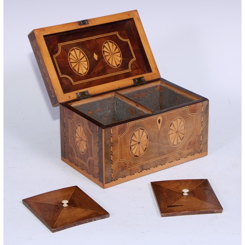 5102 - A George III mahogany and marquetry rectangular tea caddy, inlaid with oval batwing paterae, hinged ... 