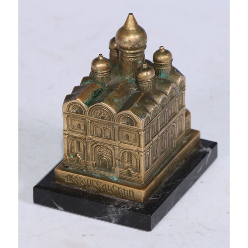 5200 - A Russian desk model, cast as a cathedral, rectangular marble base, 6.5cm long