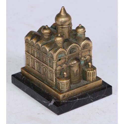 5200 - A Russian desk model, cast as a cathedral, rectangular marble base, 6.5cm long