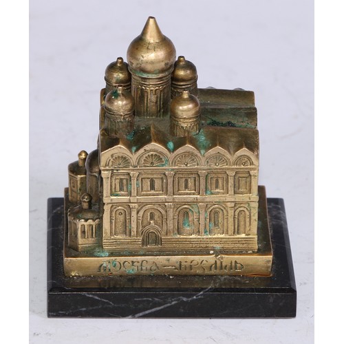 5200 - A Russian desk model, cast as a cathedral, rectangular marble base, 6.5cm long