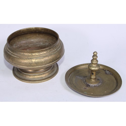 5070 - A Chinese bronze bowl and cover, chased with lotus and trellis, spire finial, domed foot, 24cm diam,... 