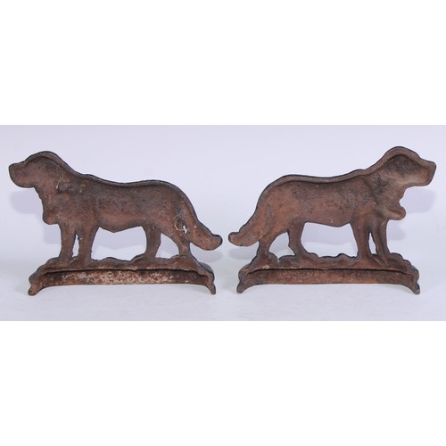 5164 - A pair of 19th century cast iron novelty door stops, each as a St Bernard dog, to left and right, 25... 