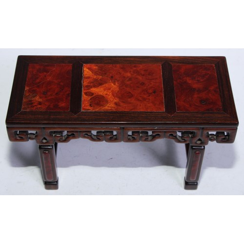 5073 - A Chinese burl and hardwood miniature altar table, panelled top above a deep frieze pierced and carv... 