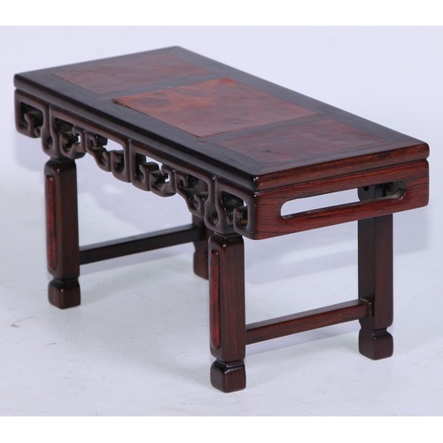 5073 - A Chinese burl and hardwood miniature altar table, panelled top above a deep frieze pierced and carv... 