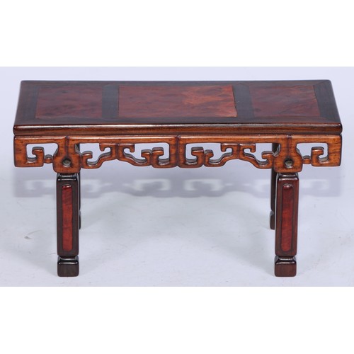 5073 - A Chinese burl and hardwood miniature altar table, panelled top above a deep frieze pierced and carv... 