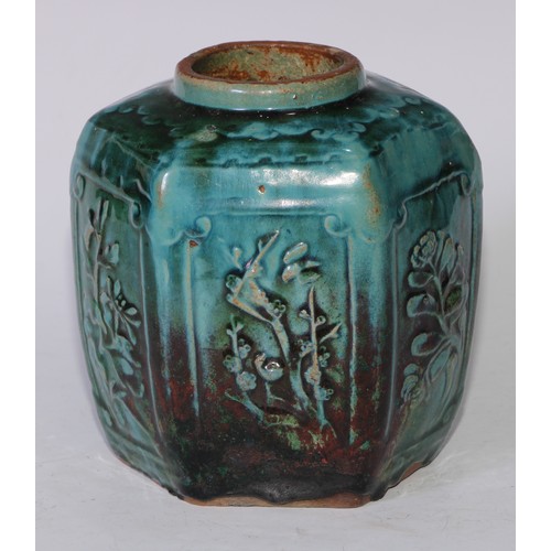 5076 - A Chinese monochrome hexagonal ginger jar, moulded in relief with prunus, bamboo and flowers, glazed... 