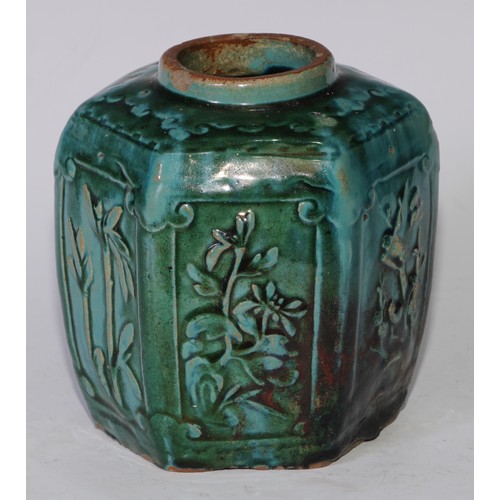 5076 - A Chinese monochrome hexagonal ginger jar, moulded in relief with prunus, bamboo and flowers, glazed... 