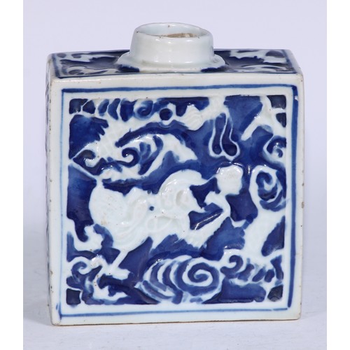 5079 - A Chinese porcelain rectangular tea caddy, moulded and painted in tones of underglaze blue with styl... 