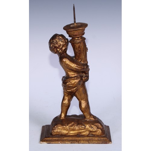 5301A - A Baroque design giltwood and gesso figural pricket candlestick, carved as a putto holding a cornuco... 