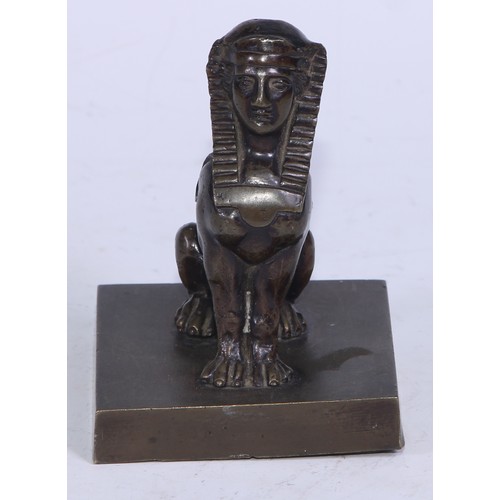 5323 - French School (19th century), a brown patinated desk bronze, of a sphinx, rectangular base, 9cm high