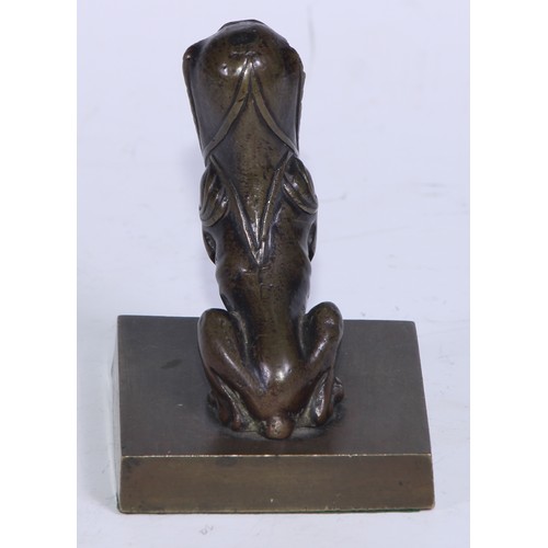 5323 - French School (19th century), a brown patinated desk bronze, of a sphinx, rectangular base, 9cm high