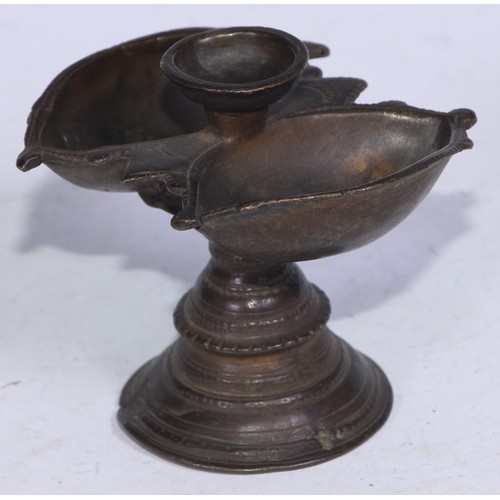 5269 - An Indian bronze lamp, lotus trumpet base, 8cm high, 19th century