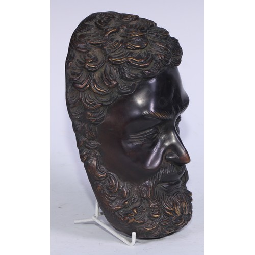 5233 - After the Antique, a dark patinated bronze mask, cast in the Grand Tour taste as the face of a beard... 