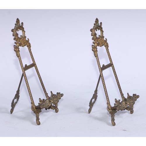 5186 - A pair of Rococo Revival brass table top easels, 23.5cm high