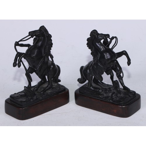 5230 - After Guillaume Coustou the Elder (1677 - 1746), a pair of dark patinated cabinet bronzes, the Horse... 